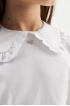 Трикотажная блузка из хлопка с оборками